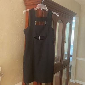 Cute peep hole black dress to go out for a party or during the holidays!